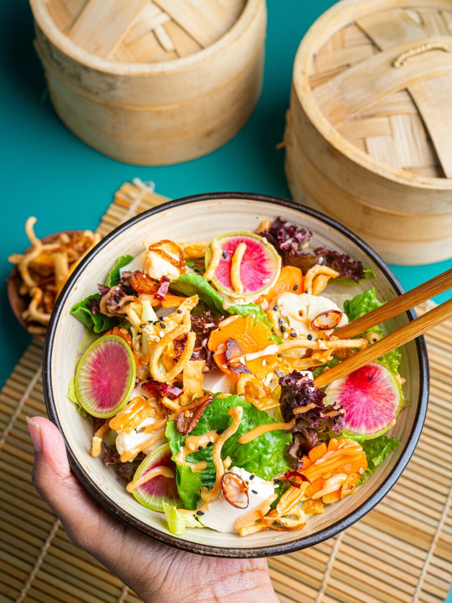 Asian crunch salad with tofu, watermelon radish, and sesame-chilli dressing